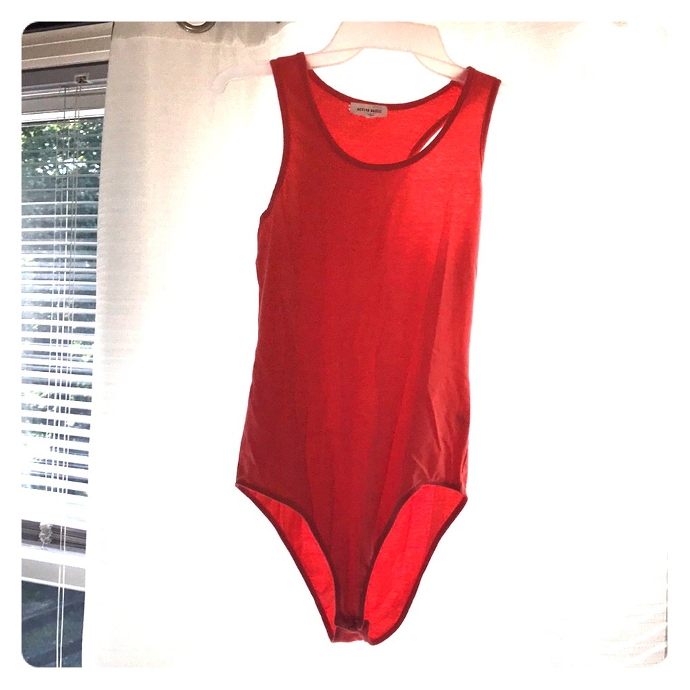 Peach colored tank top body suit